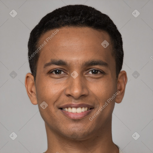 Joyful white young-adult male with short  black hair and brown eyes