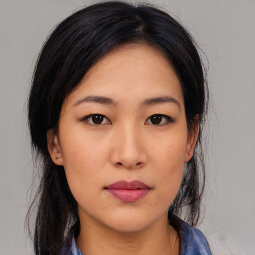 Neutral asian young-adult female with medium  black hair and brown eyes