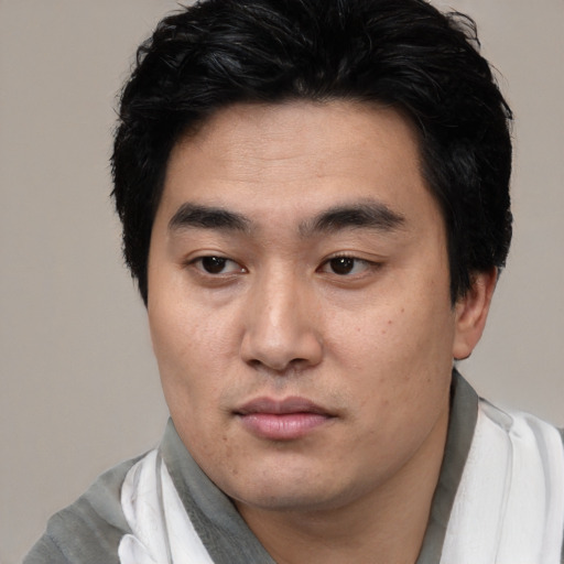 Neutral asian young-adult male with short  black hair and brown eyes