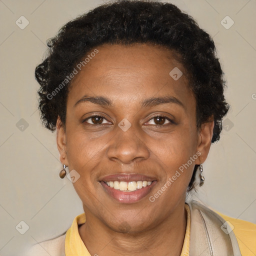 Joyful latino adult female with short  brown hair and brown eyes