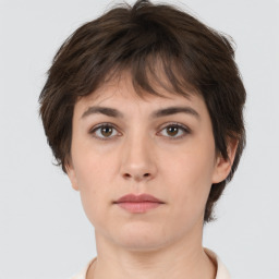 Neutral white young-adult female with short  brown hair and brown eyes