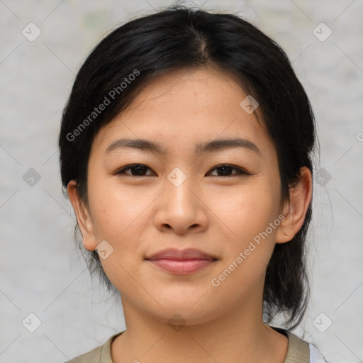 Joyful asian young-adult female with medium  brown hair and brown eyes