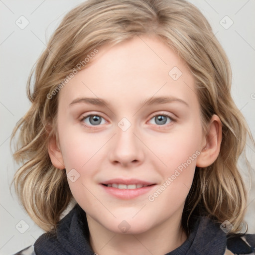 Joyful white young-adult female with medium  brown hair and blue eyes