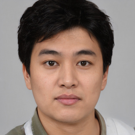 Neutral asian young-adult male with short  black hair and brown eyes