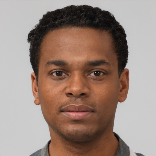 Neutral black young-adult male with short  black hair and brown eyes