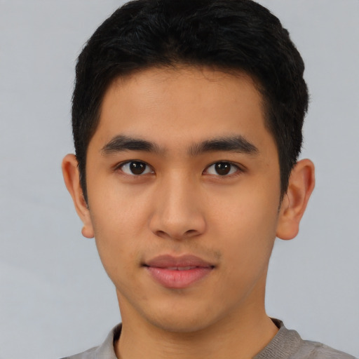 Neutral asian young-adult male with short  black hair and brown eyes