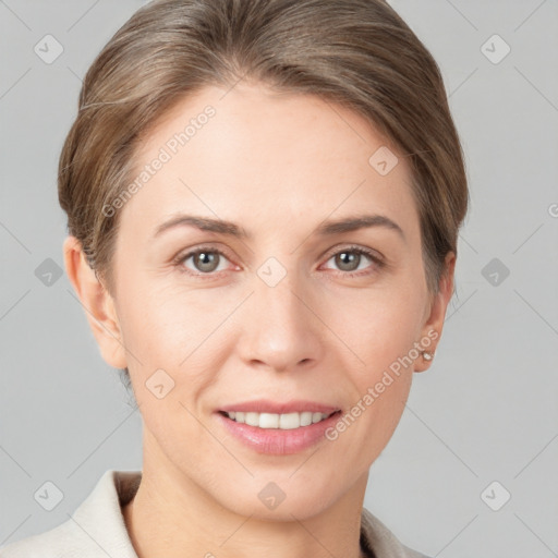 Joyful white young-adult female with short  brown hair and grey eyes