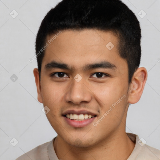 Joyful latino young-adult male with short  black hair and brown eyes