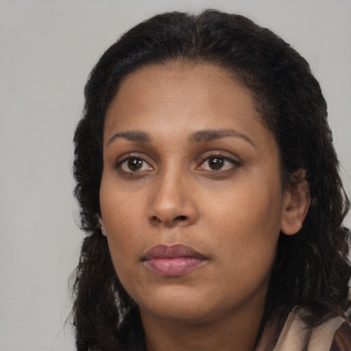 Neutral black young-adult female with long  black hair and brown eyes