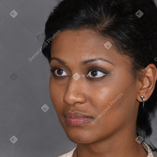Neutral black young-adult female with short  black hair and brown eyes