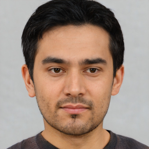 Neutral white young-adult male with short  black hair and brown eyes