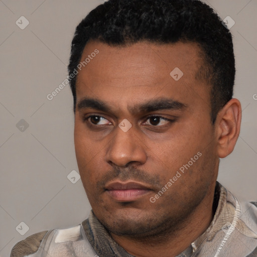 Neutral latino young-adult male with short  black hair and brown eyes