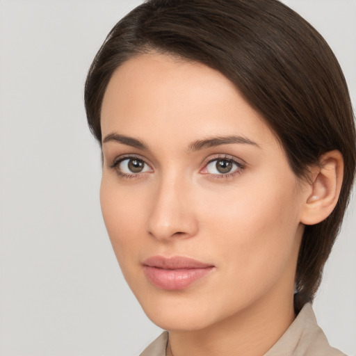 Neutral white young-adult female with medium  brown hair and brown eyes