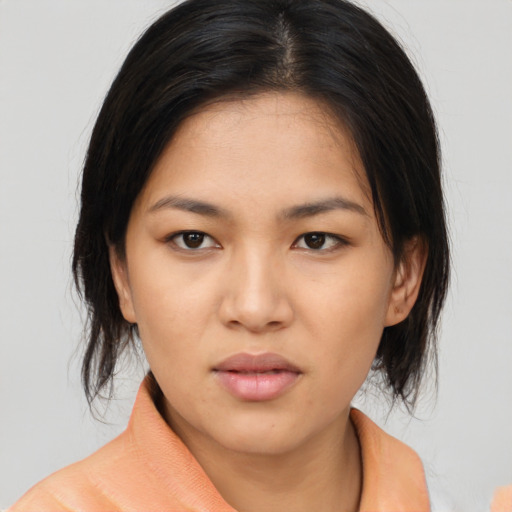 Neutral asian young-adult female with medium  brown hair and brown eyes