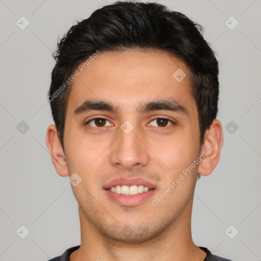 Joyful asian young-adult male with short  brown hair and brown eyes