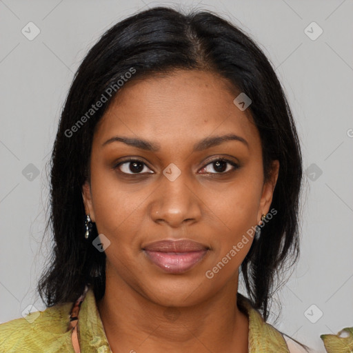 Joyful black young-adult female with medium  brown hair and brown eyes