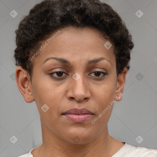 Joyful black young-adult female with short  brown hair and brown eyes