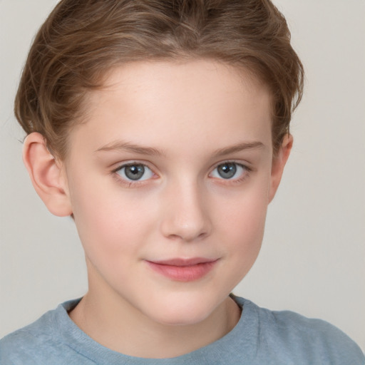 Joyful white child female with short  brown hair and grey eyes