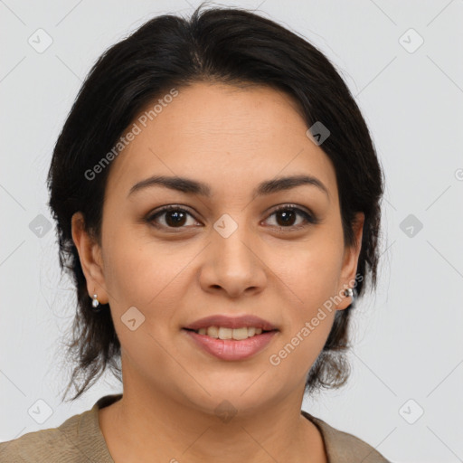 Joyful latino young-adult female with medium  brown hair and brown eyes