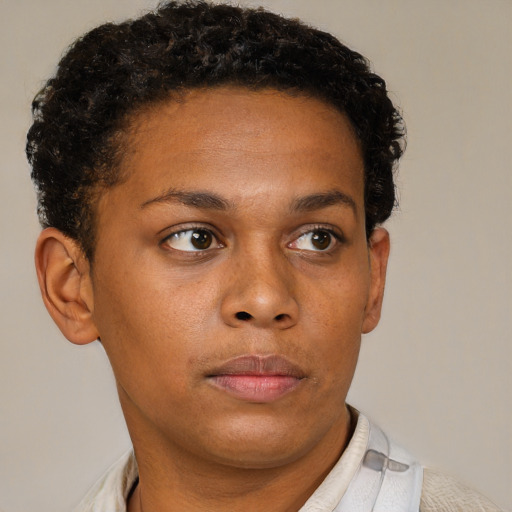 Neutral black young-adult female with short  brown hair and brown eyes