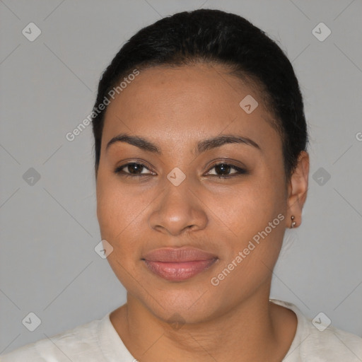 Joyful latino young-adult female with short  black hair and brown eyes