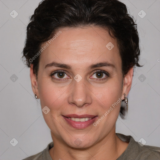 Joyful white adult female with short  brown hair and brown eyes