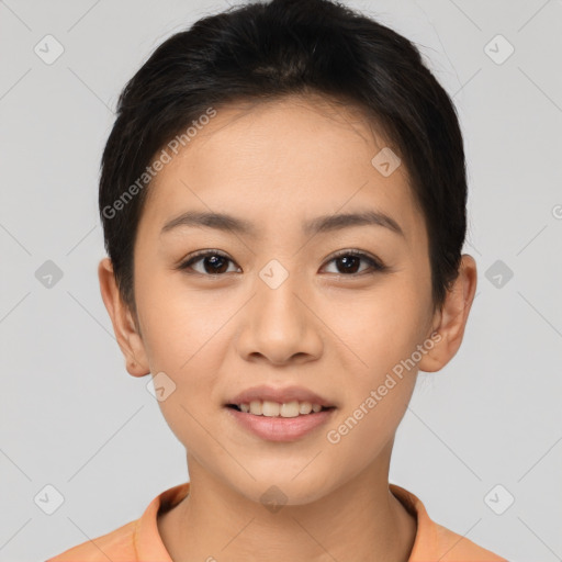 Joyful asian young-adult female with short  brown hair and brown eyes