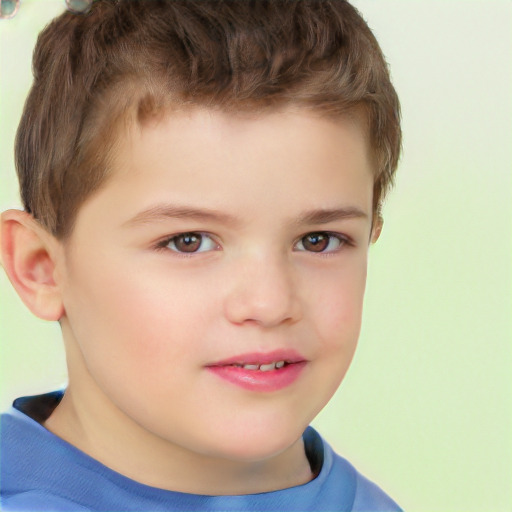 Joyful white child male with short  brown hair and brown eyes