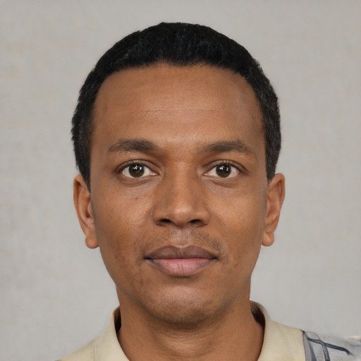 Neutral black young-adult male with short  black hair and brown eyes