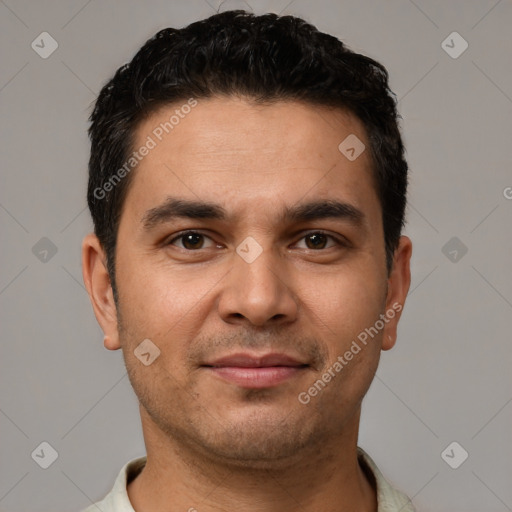 Joyful white young-adult male with short  black hair and brown eyes