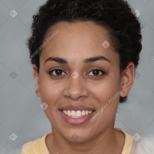 Joyful latino young-adult female with short  brown hair and brown eyes