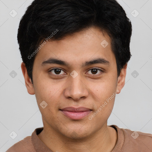 Joyful latino young-adult male with short  brown hair and brown eyes