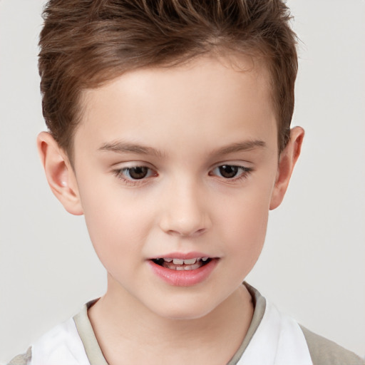 Joyful white child female with short  brown hair and brown eyes