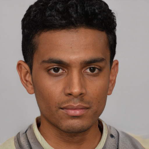 Neutral latino young-adult male with short  black hair and brown eyes