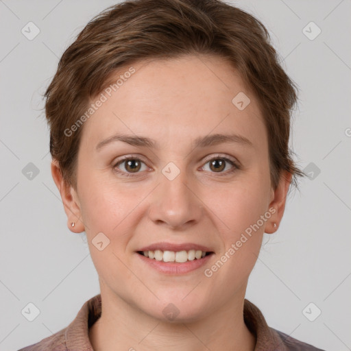 Joyful white young-adult female with short  brown hair and grey eyes