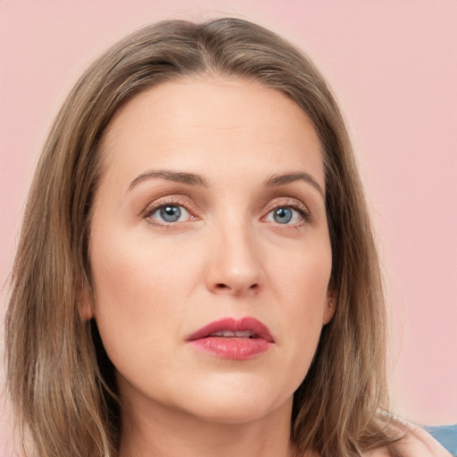 Neutral white young-adult female with long  brown hair and grey eyes