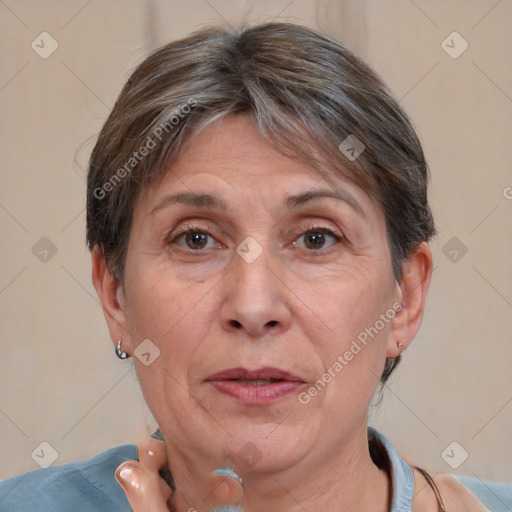 Joyful white adult female with short  brown hair and brown eyes