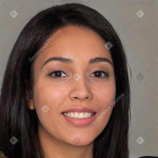 Joyful latino young-adult female with long  brown hair and brown eyes