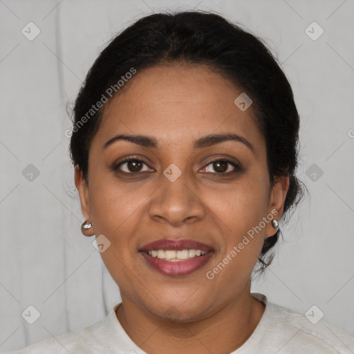 Joyful latino young-adult female with short  brown hair and brown eyes