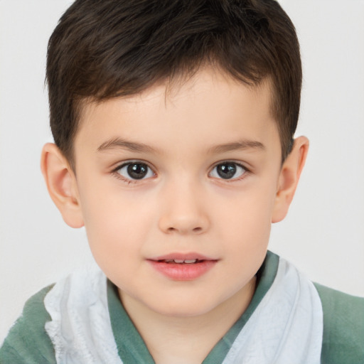 Joyful white child male with short  brown hair and brown eyes