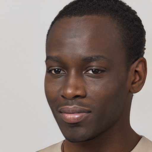 Neutral black young-adult male with short  brown hair and brown eyes