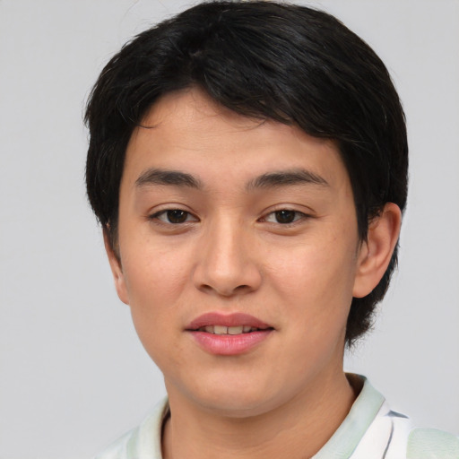 Joyful asian young-adult male with short  brown hair and brown eyes