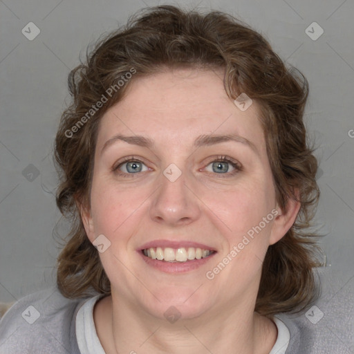 Joyful white young-adult female with medium  brown hair and blue eyes