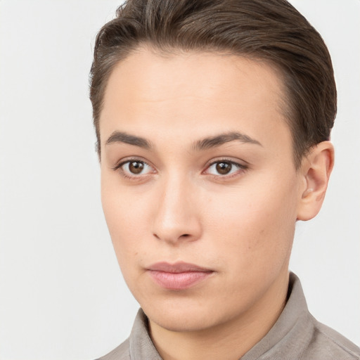 Neutral white young-adult female with short  brown hair and brown eyes