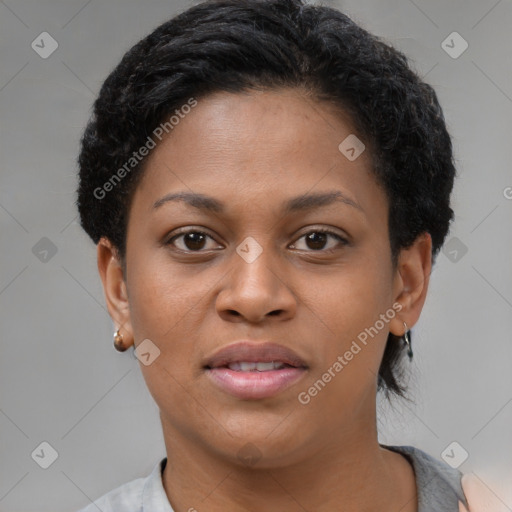 Joyful black young-adult female with short  brown hair and brown eyes