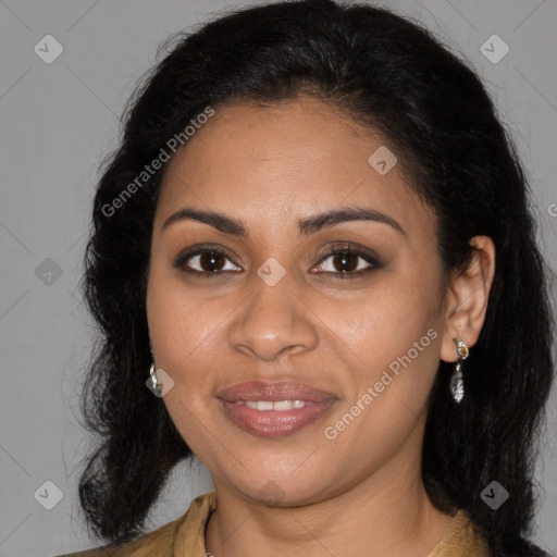 Joyful black young-adult female with long  brown hair and brown eyes