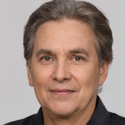 Joyful white middle-aged male with short  brown hair and brown eyes