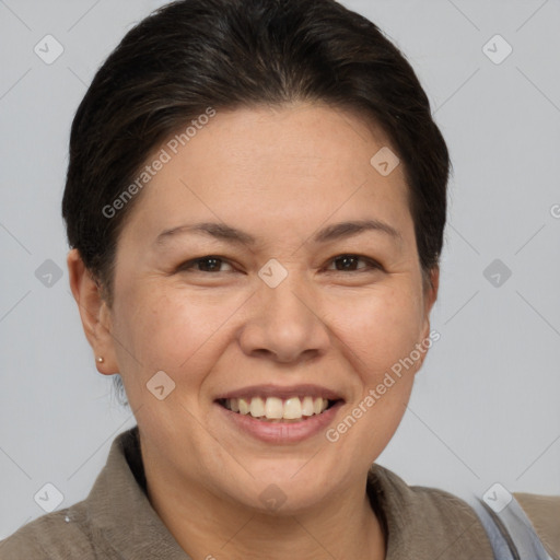 Joyful white adult female with short  brown hair and brown eyes