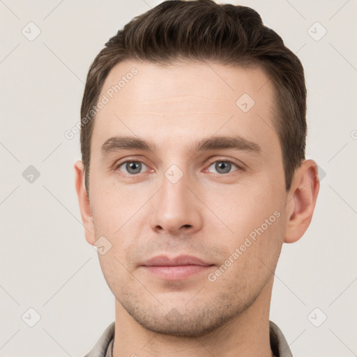 Neutral white young-adult male with short  brown hair and brown eyes