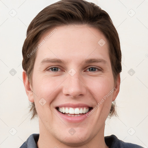 Joyful white young-adult female with short  brown hair and grey eyes